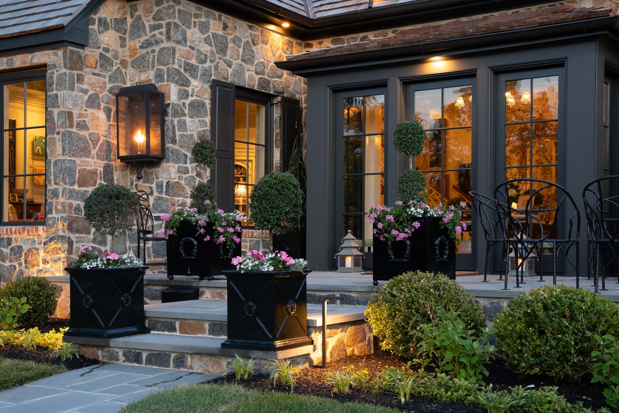 wilmington de exterior project front view of stone home with dormers illuminated steps and landscaping