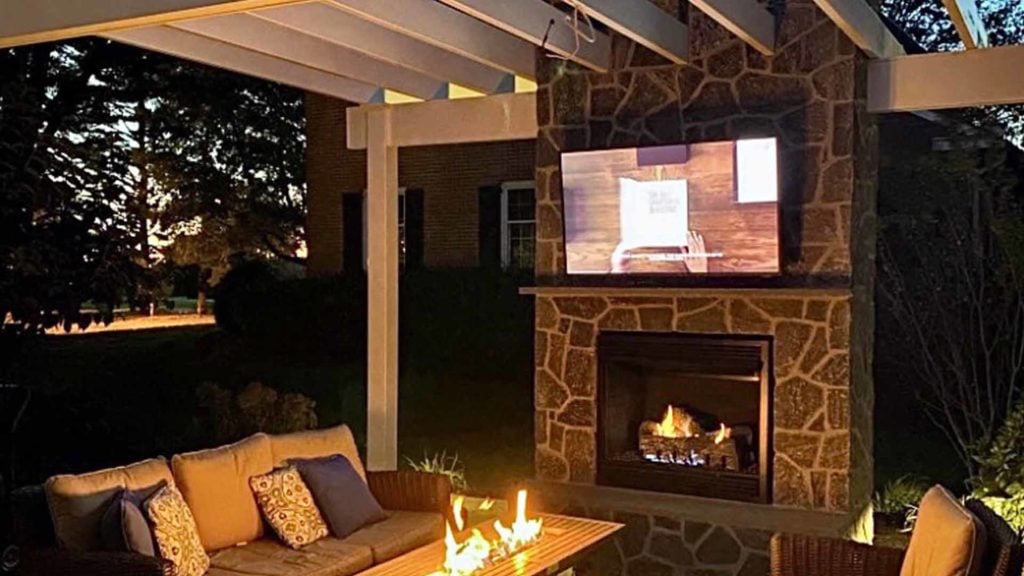 Outdoor Fireplace on Patio Under Pergola in Delaware Valley